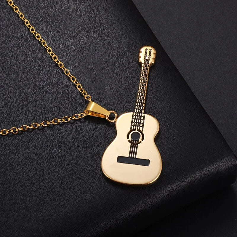 Acoustic Guitar Necklace Gold on Black background | Sacred Tune