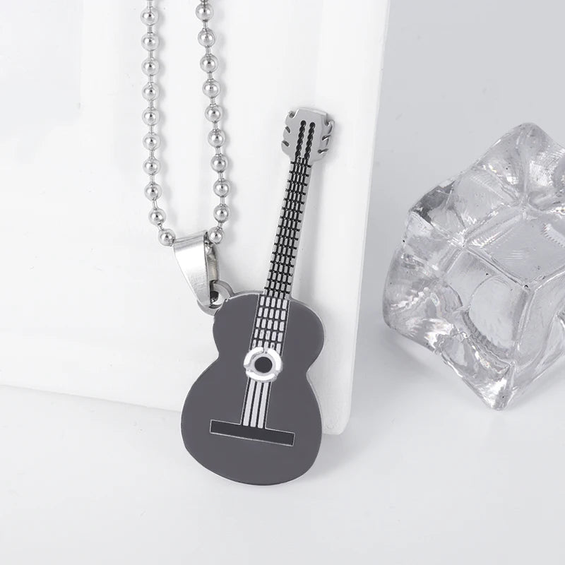 Acoustic Guitar Necklace in Black on edge | Sacred Tune
