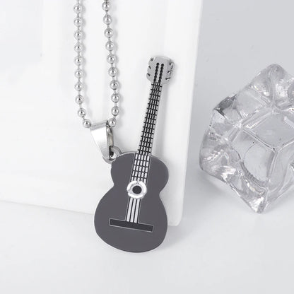 Acoustic Guitar Necklace  in Black on edge | Sacred Tune