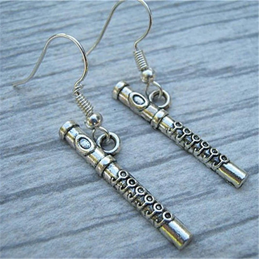 Flute Earrings on table | Sacred Tune