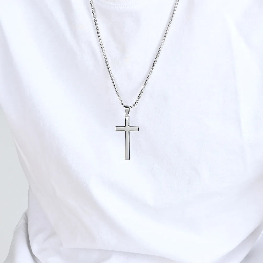 Stainless Steel Cross Available in Gold Silver and Black - Silver Necklace worn on white shirt | Sacred Tune