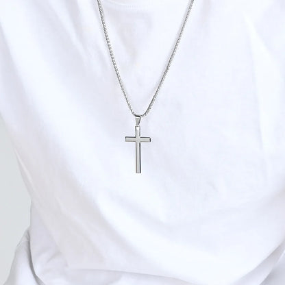 Stainless Steel Cross Available in Gold Silver and Black - Silver Necklace worn on white shirt | Sacred Tune